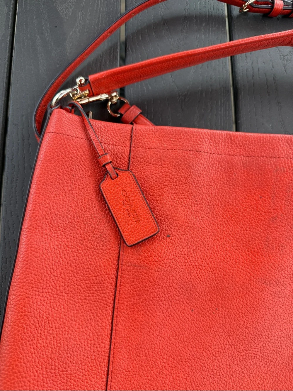 Large coach bag leather on orange color